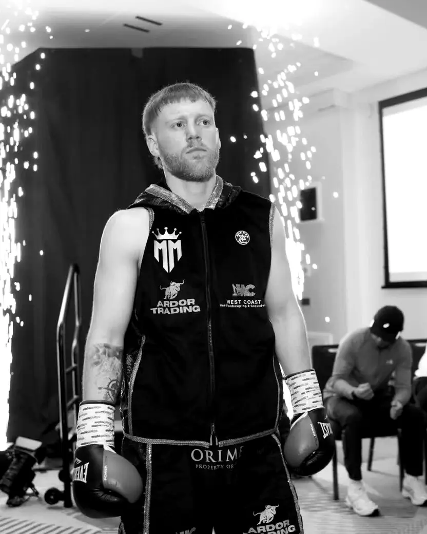 Matthew McDonald walking out to the ring, sparklers behind him
