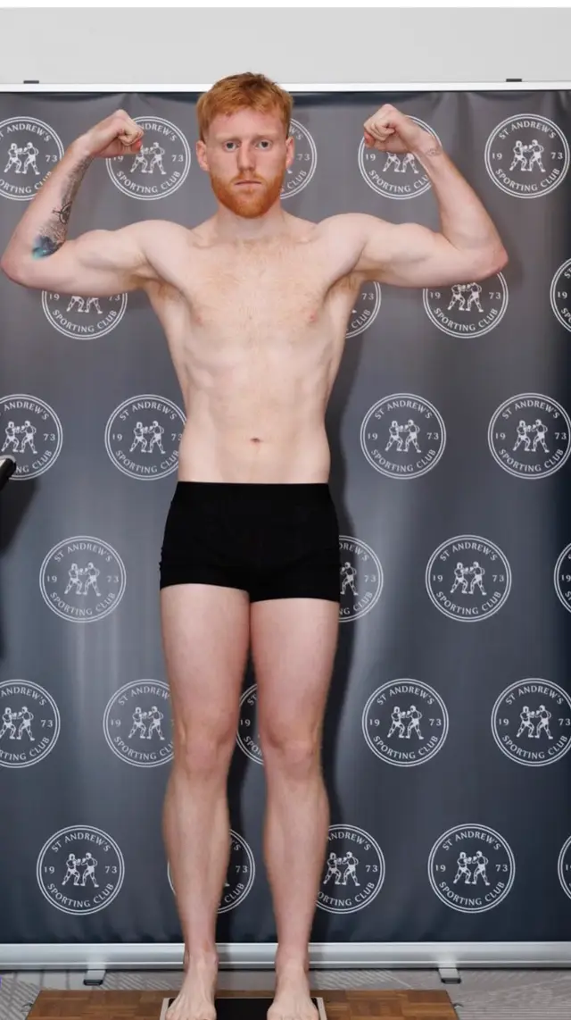 Matthew flexing on the scales at a weigh-in