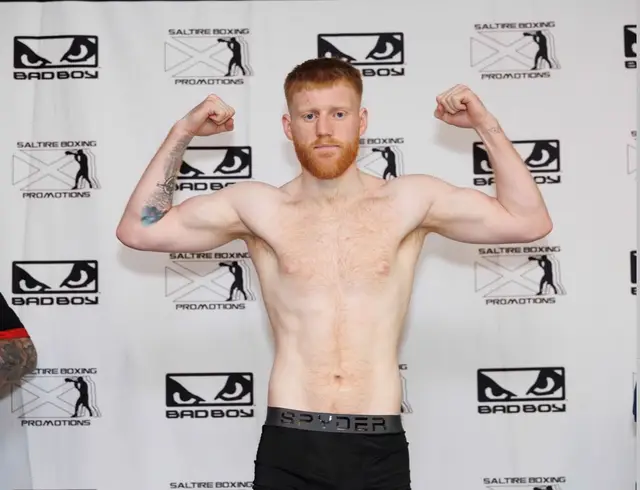 Matthew flexing at a Saltire Boxing Promotions weigh-in